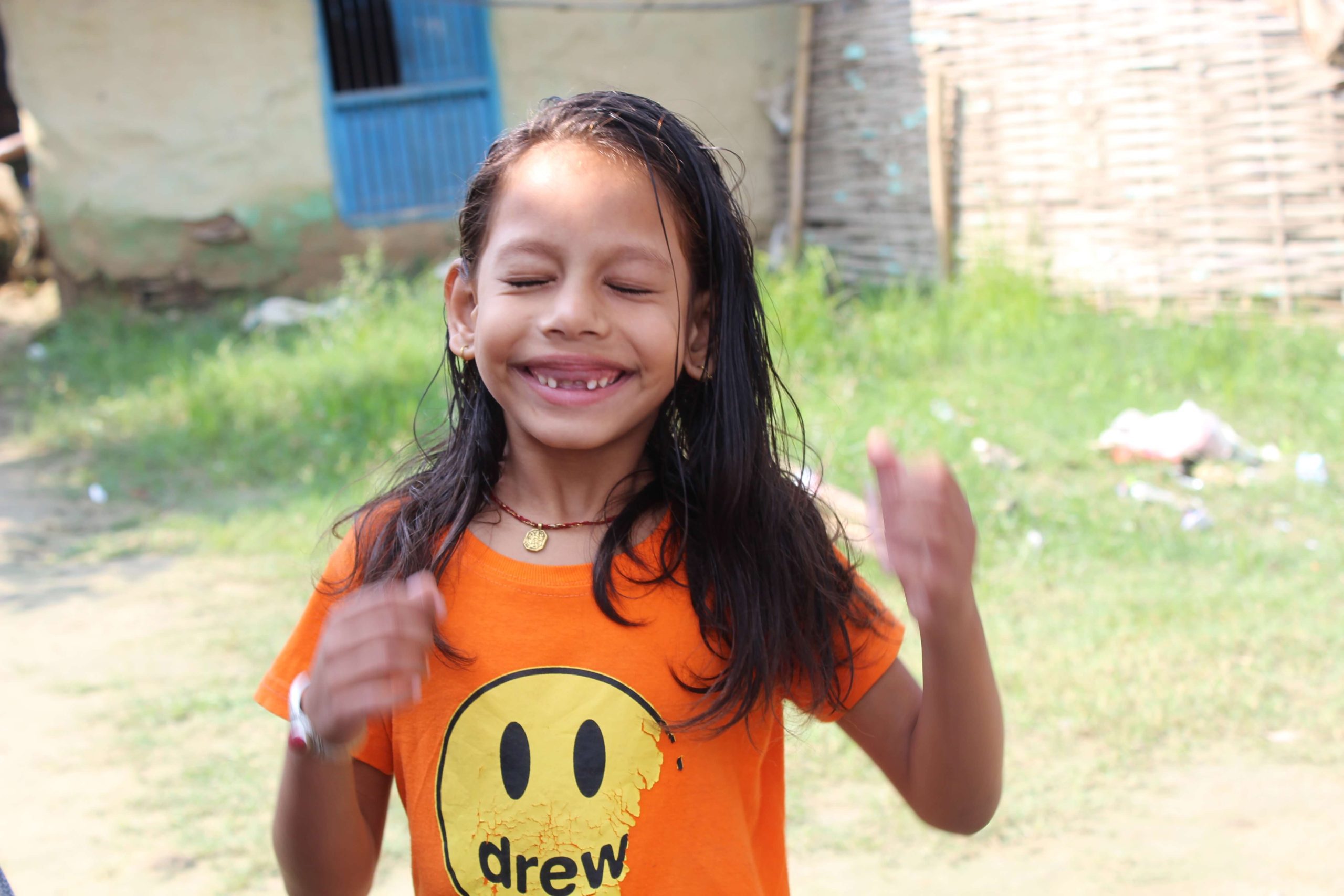 a smiling girl: Aarushi is happy after being enrolled in special educations school